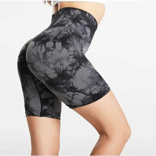 Yoga biker shorts for women with a tie-dye design, high-waisted and seamless for comfortable workouts, running, and outdoor activities