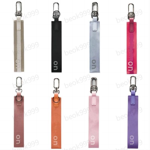Yoga keychain for women - stylish elastic fitness accessory with coin pocket in pink