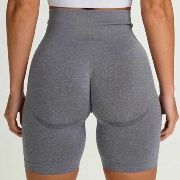Yoga leggings for women with peach-toned design, high-waisted seamless gym shorts for running and fitness