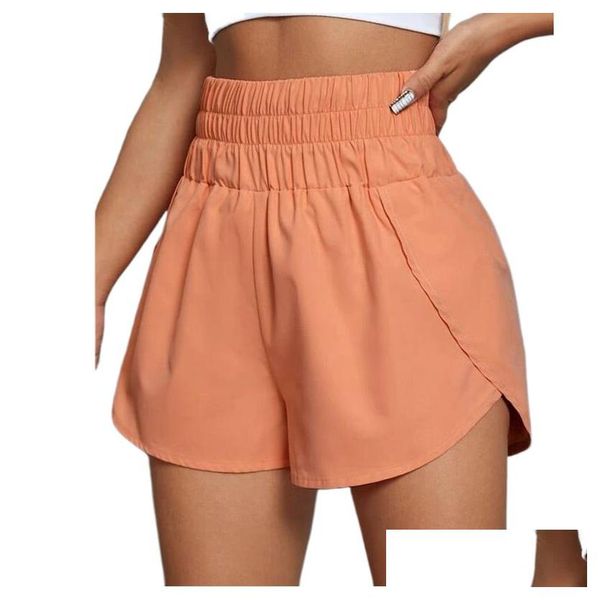 Yoga outfit with high-rise shorts featuring quick-dry fabric, loose fit, back zipper pocket, and comfortable design for running