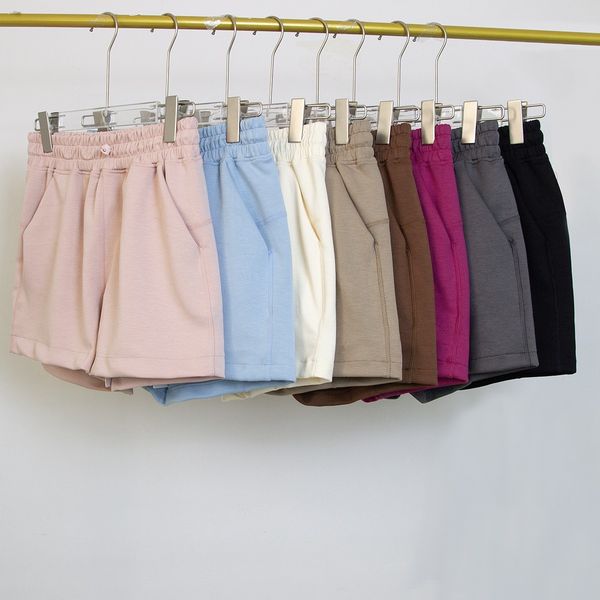 Yoga Softstreme High-Rise Short 4" with front pockets, made from breathable Softstreme fabric for sports, outdoor activities, featuring a loose wide-leg silky high-waisted design