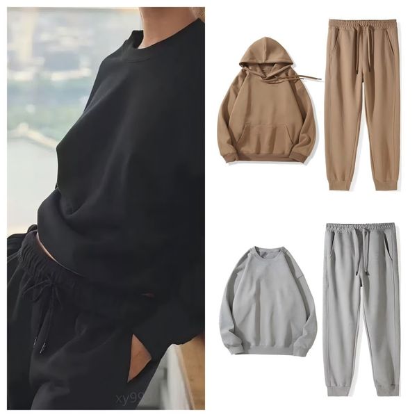 Yoga sweatshirt and sweatpants set featuring a silver 3D logo, designed for both women and men as comfortable unisex casual wear with an oversized sweater and hoodie