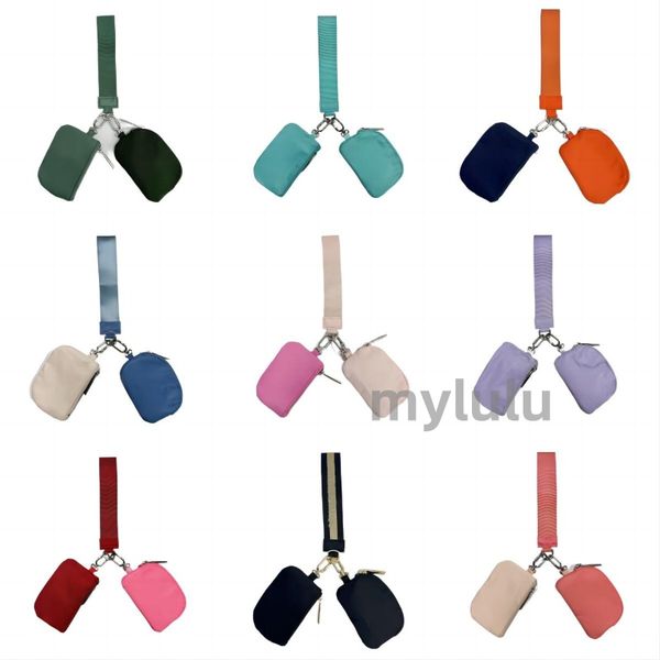 Yoga yoga detachable zipper wrap around wrist portable keychain coin wallet mini pink pocket bag