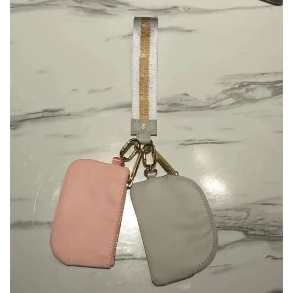 Yohain's compact dual pouch mini zip wristlet is a portable wallet with a coin purse and pocket from lululies